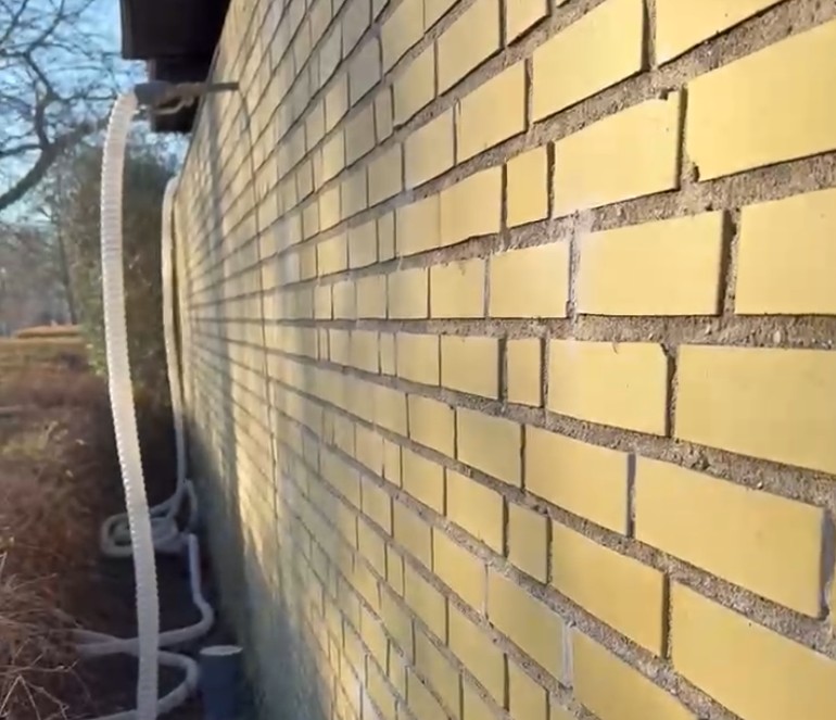 Hulmursisolering i murstenshus